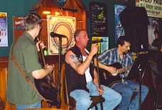 Corey singing at the Gaslight