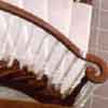 View from above of a dark wook and white staircase