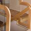 A contempory glass and wood staircase