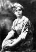 Maude Adams as Peter Pan seated pose