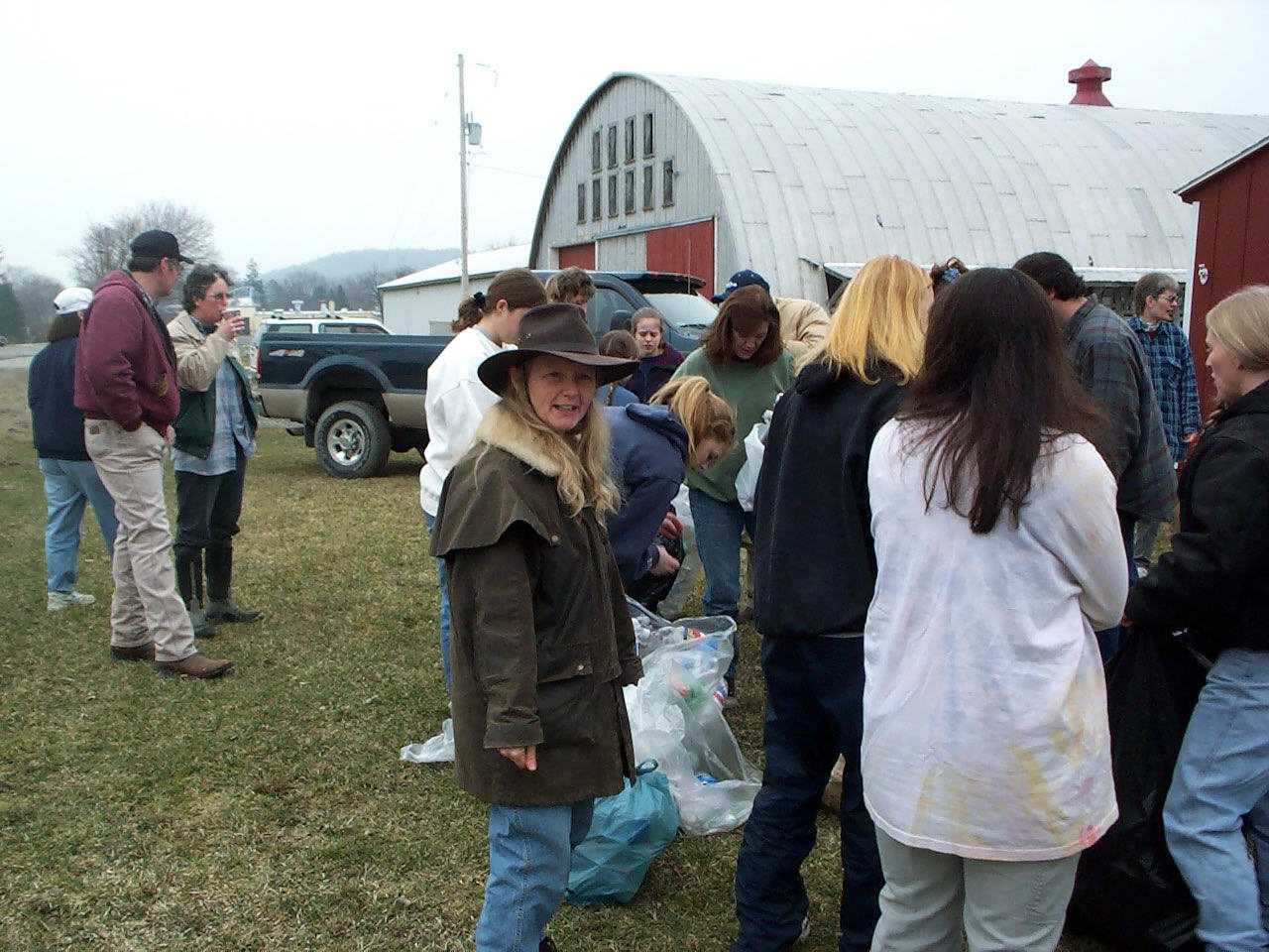 *Members sports the "Survivor" look...Count those cans! It's going to rain!