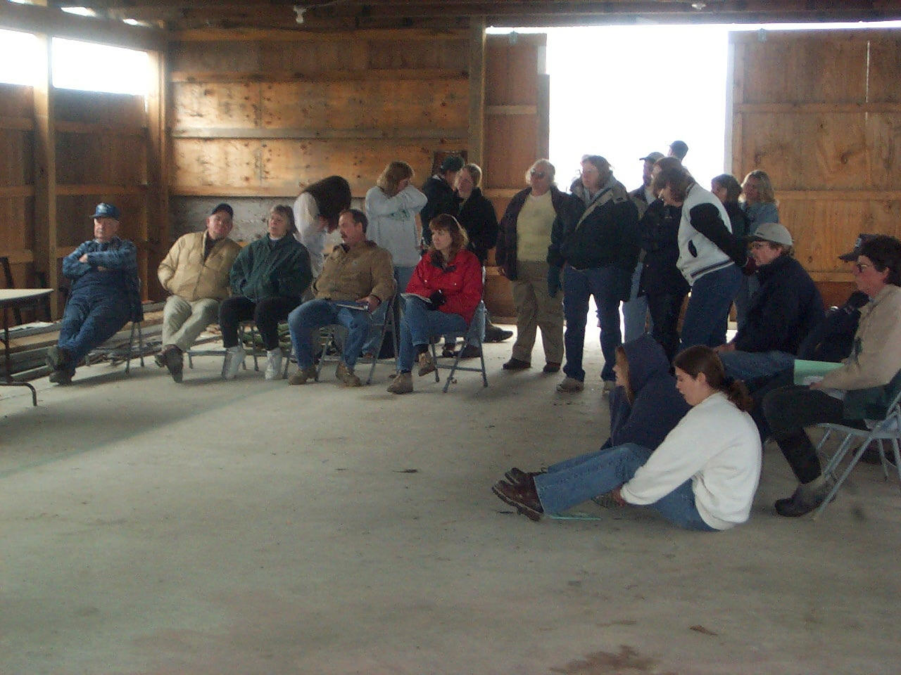 Members ready for the meeting... avoiding the rain!