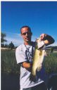 Matt & one of the many large-mouth bass caught during this fishing trip up north @ Clear Lake, CA (2 hrs north of San Francisco)