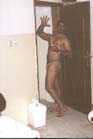 Omar enjoys walking around almost naked in front of anyone at his place.