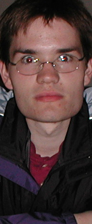 here's Bill, who is probably going to rule the world within a few years. He'll definitely be the first world leader to operate out of a three bedroom apartment in Lawrence, Kansas. Not that this is a bad thing, I mean this apartment is the shit, you should see it. Bill has like a walk-in closet and a wall made of mirrors. Imelda Marcos should be so lucky. Bill almost made this movie a year ago called Slippery Emoy Rides Again, which would have featured emoy, me and a horde of extras. I think the reason the movie was never made is because he spent all the money on this scene where I sort of morph into Ryan, leaving the rest of the movie on a budget of about five cents. So it never really happened, but one day, one day... Bill and I used to work on the Eastonian a long time ago, the two of us contributed roughly 99% of the material worth reading that well. Oops, did I say too much? I hope Susie doesn't put us in detention! Click to see Bill get down with his bad white boy self.