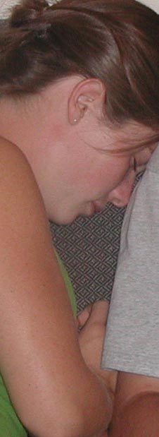 sssshhhh, Hannah is sleeping... something she probably doesn't get to do a lot at the University of Kansas, where she goes to school (not necessarily of her own volition, but that's a whole other story). She's also separated from the horses that she loves so much, and yet she likes college, or at least tells people she does. Yeah, she has a lot of horses or at least has one and rides a lot of them. I don't personally trust horses, mainly because one of hers wanted to kill me. Oh, it wasn't in anything the horse said or did, I could just see hate in its beadly little eye... someday, horse, you and I are going to clash. For some reason Hannah gets taken advantage of at an alarming number of parties, though it's usually not too severe (besides, I think she likes it). She's also my ex-girlfriend, but we're still good friends, believe it or not. Click here to see her with Brian, in a position she seems to end up in quite often. Hey, don't ask me.