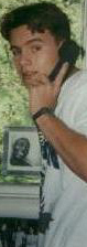 here's Jack, Mr. Popular himself talking on the phone, to whom I have no idea, but it's not really important. Jack goes to University of Missouri despite my warnings that in order to go there he would actually have to live in Missouri. The brave man has toughed through it though, and is now a successful attorney at law... wait, that's not right. Actually he's a fratboy, but we won't hold that against him. Jack loves nothing more than a good meal of beer and pizza. Well, except maybe football. Or nintendo. Or Metallica. Or 311. Well, let's just say he has many diverse interests and leave it at that, then, eh? Click here to see a cute picture of Jack with his girlfriend Lauren, at some sort of formal. Spring formal? Winter formal? Damned if I know, I can't keep up with these Greek thingies.