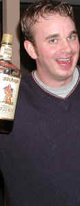 wacky Steve, here about as inebriated as any self-respecting college student on the night before his finals. Steve now also goes to K-State (now population 23) which is further evidence that the Apocalypse is nigh at hand. Also, he really likes to be jack-slapped. (If you don't know what a jack-slap is I'll be happy to demonstarte one to you sometime). Steve is constantly trying to convince me that Ben Folds Five is the greatest band in the world, though in doing this he often tends to sing along to their songs. Now I have nothing against Steve, but his singing is often used as a torture device in the Middle East. By the end of 'Song  For the Dumped' I'm usually begging him to cut my fingers off or anything. Oh well, I figure eventually we will either have developed closable ears or Ben Folds won't be on the radio anymore. Click this to see Steve and Brooke, who I don't know that well but is on here anyway. Go Brooke.