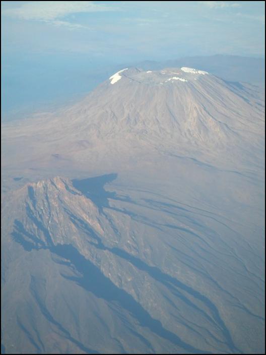 Kilimanjaro from an airplane, yes, we couldn't escape from the sounds of airplanes
