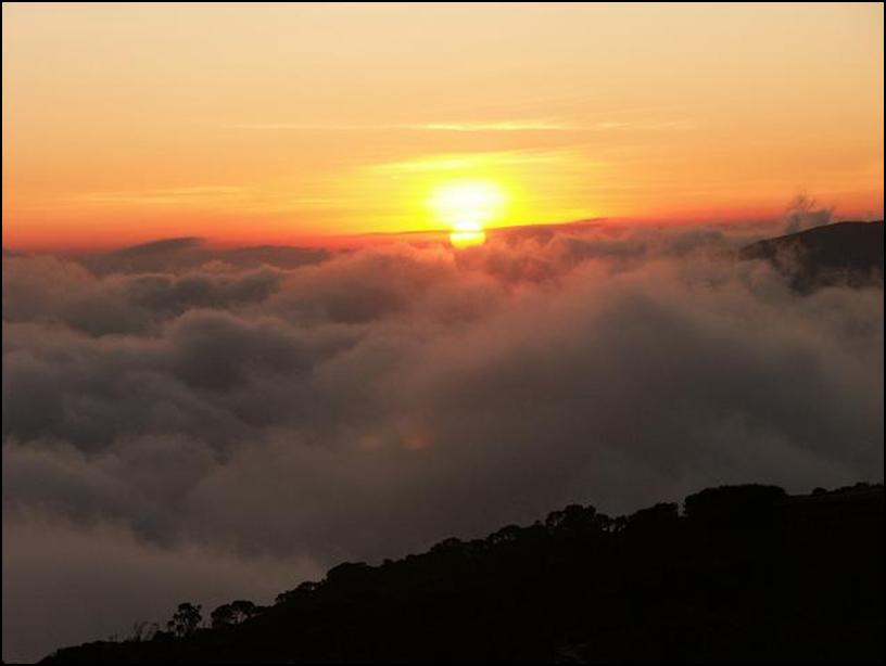 sunset into the clouds