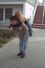 Nataliya enjoys riding on Seth's back so much, she doesn't even notice her bushy tail slipped out of her pants!