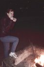 Nataliya delicately bites into her s'mores creation.  Mmmmm!
