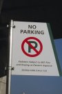 Who do I give my three $20s, one $5, and two $1s to for illegally parking?