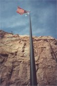 American flag flying over the Hoover Dam.