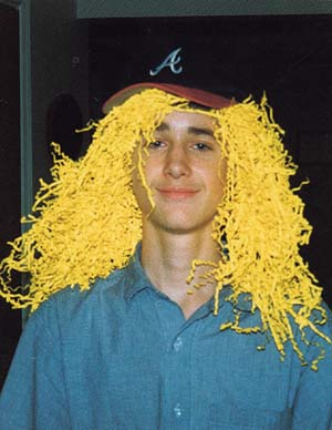 Yes, the "hair" is fake. This is a photo of me. It was take about a year ago.