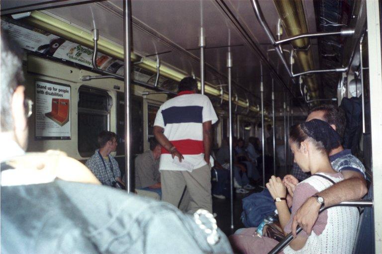 The inside of a Subway Car ( the person that is standing is our guide Daniel)