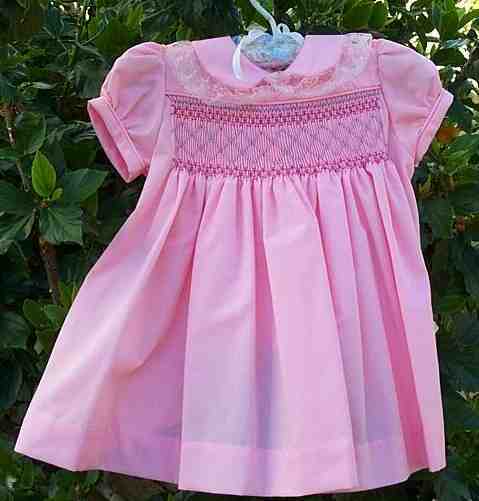 Smocked, pink baby dress
