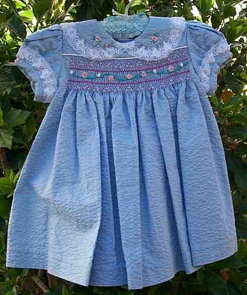 Blue seersucker, smocked, beaded, embroidered dress