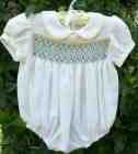 Smocked, enbroidered and beaded baby rompers