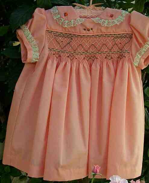 Peach, smocked, embroidered, beaded dress