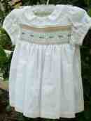 Smocked, embroidered, beaded baby dress