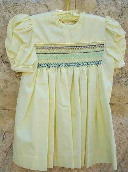 Smocked, embroidered dress