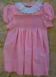 Smocked dress with broderie frill