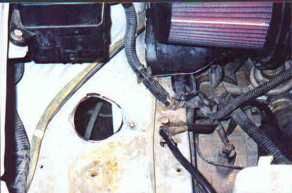 Bore hole beside battery dish