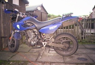 Finally home... 700and something miles of fast A roads..., filthy dirty, shagged chain, shagged back tyre, but the wear on the tyre tells you how much fun the trip back was ;-)