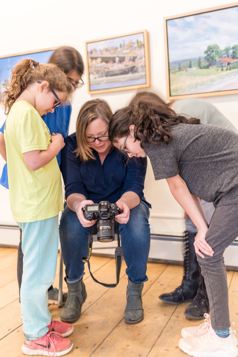 Amy teaching photography to sudents at Unison Arts in New Paltz, NY