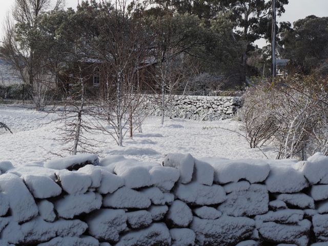 Snow on rock wall