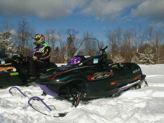 She loves riding this sled!