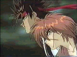 Kenshin and Sanosuke facing evil together.