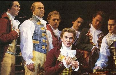 Douglas as Percy, with the cast