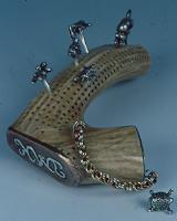 The chain is brass, copper and silver.