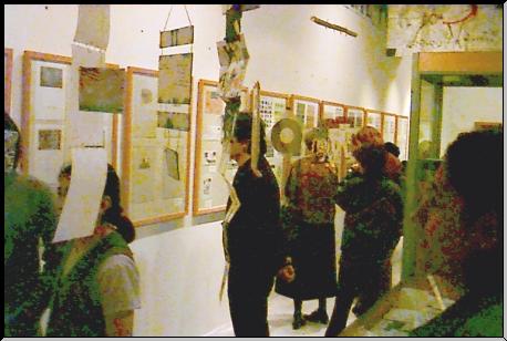 The guests examine the exhibition material.