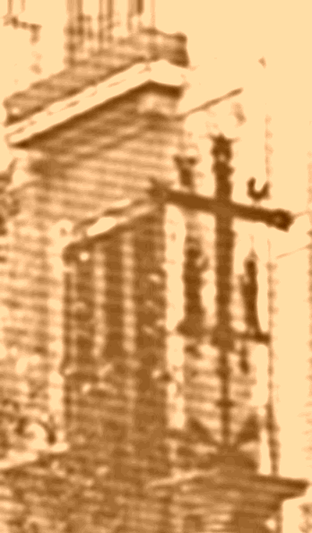 Cruz de hierro conmemorativa lugar donde estuvo la antigua Parroquia