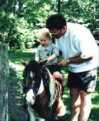 Sunrise Estate Miniature Horses - The twins first horse rides.