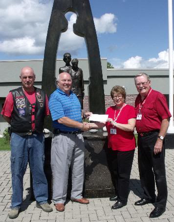 President Dick Rutter of the Orleans Legion accepts cheque from RED Ribbon Forces with the Support of NP Smokey, Canadian Veteran Freedom Riders