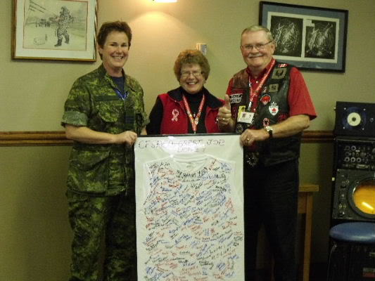 Support troops T-Shirt presented to L/Col Claveau of CFSACO Air Force group, Cornwall On. from many proud Canadians!!