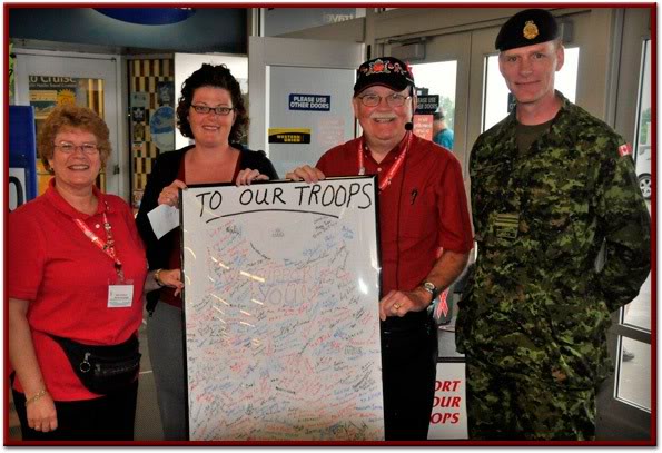 T-Shirt signed by many proud Canadians presented to CFB Petawawa and a cheque presented to Petawawa MFRC.