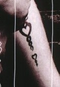 Josh's heart design on right forearm