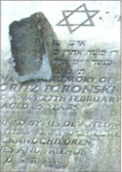 Damaged:	One of the graves