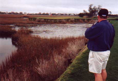 John surveys the spit of land Jack calls a green
