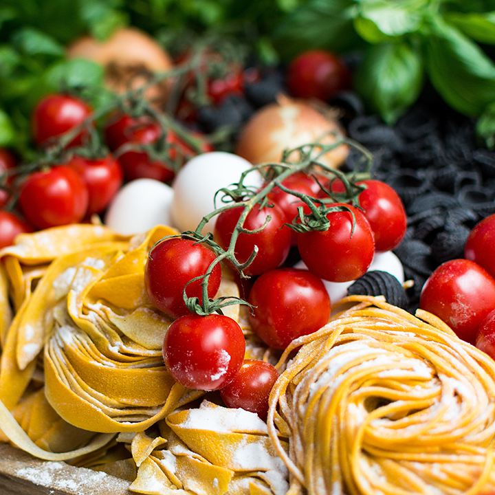 Nested Pasta Alfredo with Tomatos