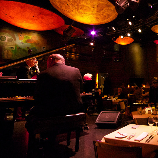 image of piano player in cocktail lounge
