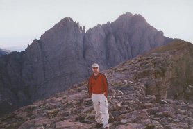 Bryan on Humboldt the night prior to the climb, with the Ledges route in the background