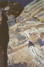 Julie follows Elephant Mans first pitch at Indian Creek (10a)
