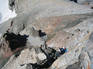 Josh and Fran hang at the Black Face belay on the Lower Exum