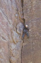 Julie leads the first pitch of Green Dihedral, Mickey Mouse Wall...
